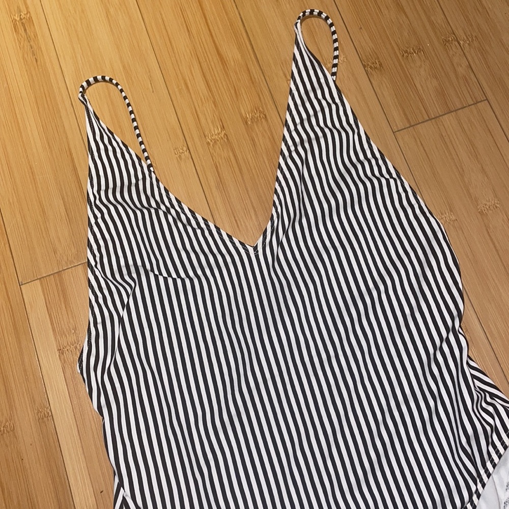 Flattering striped black and white one-piece